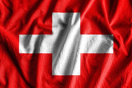 Waving flag of Switzerlandの写真素材