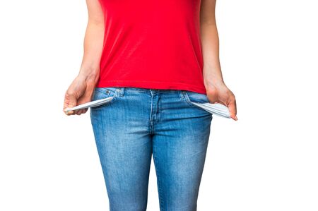 Young woman pulling out empty pockets isolated on white backgroundの写真素材