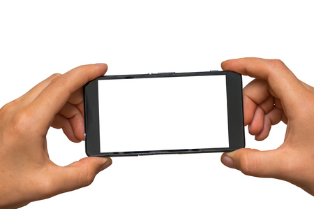 Woman hands taking photo with mobile cell phone of blank white screen, isolated on whiteの写真素材