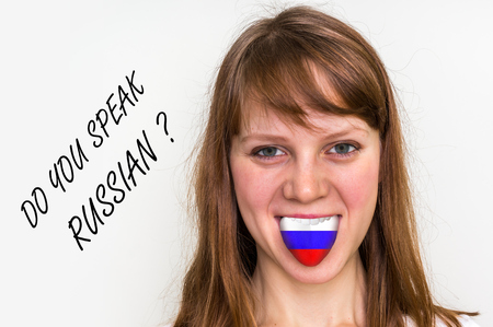 Do you speak Russian? Woman with flag on the tongue - isolated on white backgroundの写真素材
