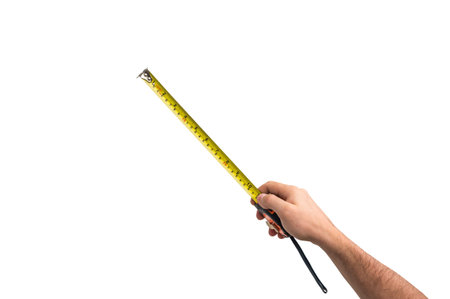 Tape measure in hand of worker isolated on white background