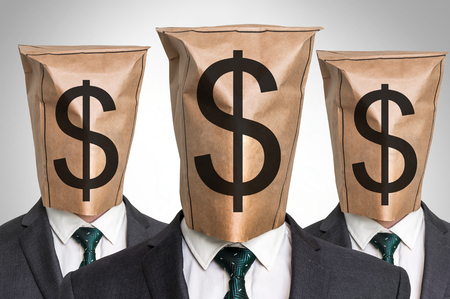 Three business mans with a paper bag on the head - with dollar signの写真素材