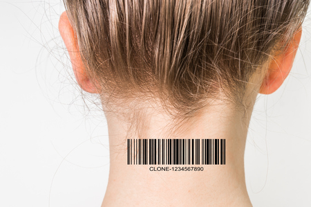 Young woman with barcode on her neck - genetic clone conceptの写真素材