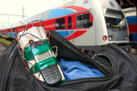 Dynamite bomb with phone in terrorist bag on train station - terrorism conceptの写真素材