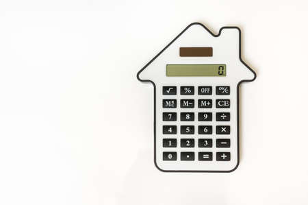 Calculator isolated on white - lease, purchase, investment, mortgage, real estate, sell and buying conceptの写真素材