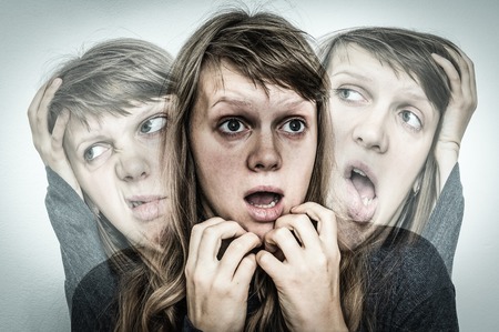 Woman with split personality suffers from schizophrenia - schizophrenia disease conceptの写真素材