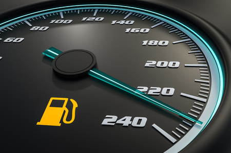 Low fuel level light on car dashboard. 3D rendered illustration.の写真素材
