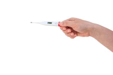 Hand of woman is holding digital thermometer - isolated on white background