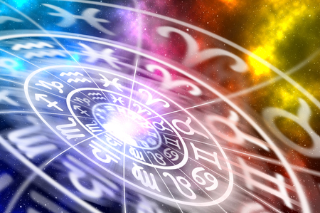 Astrological zodiac signs inside of horoscope circle on universe background - astrology and horoscopes conceptの写真素材