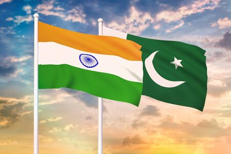 Relationship between the India and the Pakistan. Two flags of countries on heaven with sunset. 3D rendered illustration.の写真素材