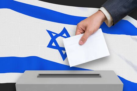 Election in Israel - voting at the ballot box. The hand of man is putting his vote in the ballot box. 3D rendered illustration.の写真素材