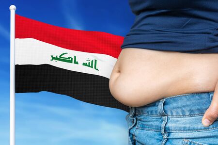 Obesity problem in Iraq. Overweight woman on background of national flag. 3D rendered illustration.の写真素材