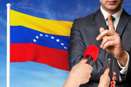Press conference in Venezuela. Candidate give interview to media. 3D rendered illustration.の写真素材