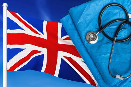 Health care in United Kingdom. Stethoscope and medical uniform on national flag background.の写真素材