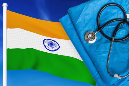Health care in India. Stethoscope and medical uniform on national flag background.の写真素材