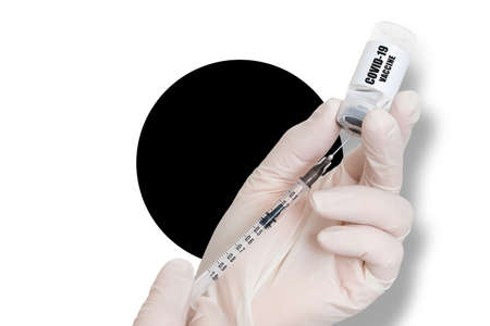 Vaccination in Japan. Vaccine to protect against Covid-19 on black and white background of national flag.の写真素材