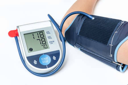 Blood pressure monitor with normal pressure level isolated on whiteの写真素材