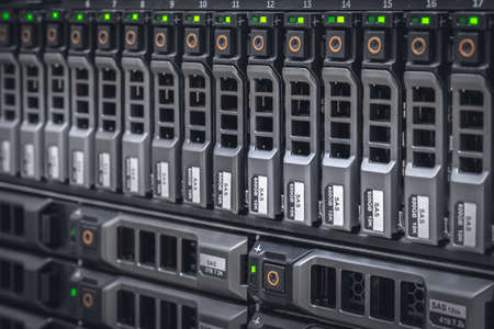 Storage server with many HDD disks inside rack in server room - data center conceptの写真素材