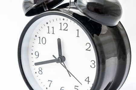 Retro alarm clock with double bell isolated on white backgroundの写真素材