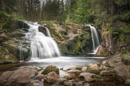 The Elbe (Labe) river and waterfall in the mountains of Czech Republicの写真素材