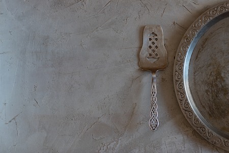 vintage tableware on empty cement grey backgroundの写真素材