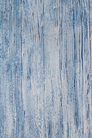 Old and grunge white and blue color wooden vertical backgroundの写真素材