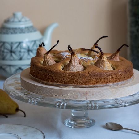 Pie with pears on the defocused backgroundの写真素材