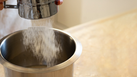 Making pastry, knead, prosess, bolt flour metal dough maker bowl, movement, selectuve focus, healthy food, nutritious, close up, copy space horizontalの写真素材