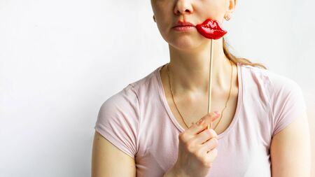 Lower part part of woman face with Red bubbles of virus herpes on her mouth she tries to hide with red lips on slick for party, Zoster, Cold, Medicine, Treatment. Horizontal copy space,の写真素材