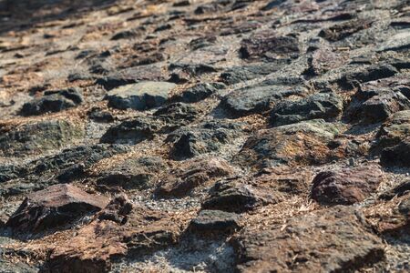 Natural stone cliff textured surface. Horizontal. Creative background.の写真素材