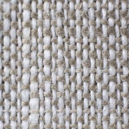 Macro of grey and white natural linen textile background. With different grains. Square. For text or designの写真素材