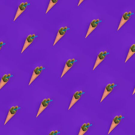 Seamless diagonal pattern with fake ice cream. Trendy Waffle cone with green cacus with sharp yellow needles and plastic spoon on bright violet background, Creative concept. Dangerous food. Top viewの写真素材