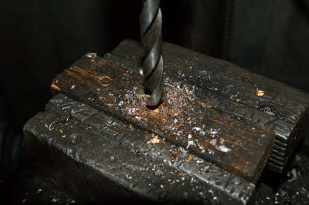 operator grooving steel bar by turning lathe and grooving holderの写真素材