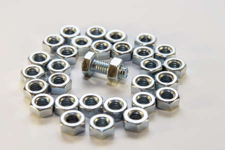 Stainless steel bolt and nut, a shop floor item, shallow DOFの写真素材