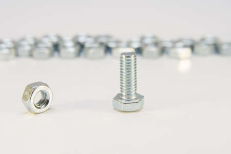 Stainless steel bolt and nut, a shop floor item, shallow DOFの写真素材