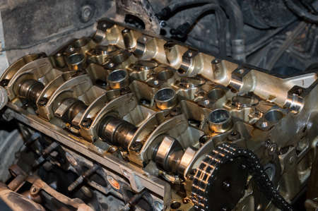 the camshaft of the vehicle, the timing chain on a disassembled car engineの写真素材