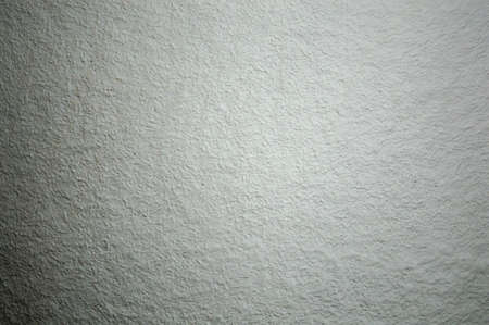 white textured wall close-up, gray wall, decorative plasterの写真素材