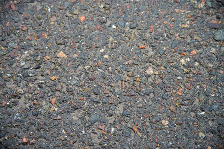 wet asphalt road texture, dark backgroundの写真素材