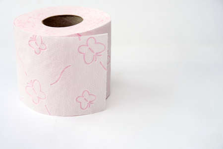 pink toilet paper roll, white background, close-up, butterflies on toilet paper, clean toilet paperの写真素材