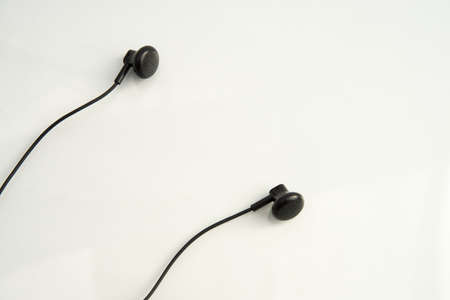 small black headphones on white background close-upの写真素材