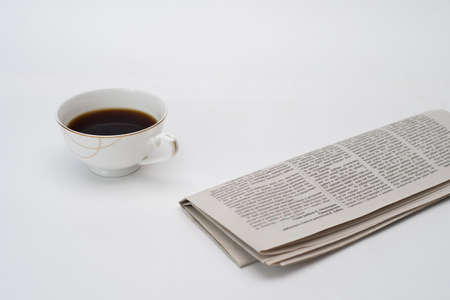 fresh coffee mug and new newspaper white background, top view, layout,の写真素材