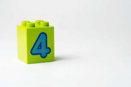 the number four written on the block from the childrens constructorの写真素材