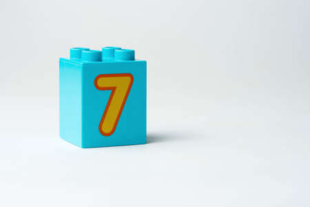 the number seven written on the block from the childrens constructorの写真素材