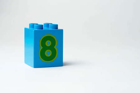 the number eight written on the block from the childrens constructorの写真素材