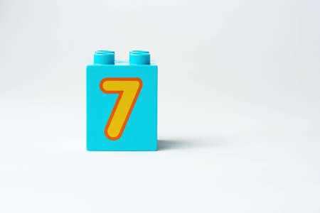the number seven written on the block from the children's constructorの写真素材