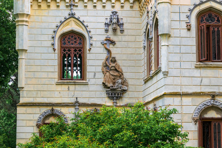 Statue on the walls of the Sturdza castle in Miclauseni, Romaniaのeditorial素材