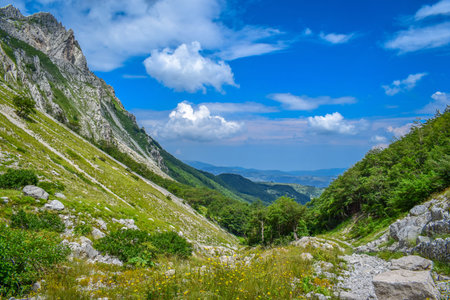 An overview that captures the mountain chain Gran Sasso located in the National Park Gran Sasso in...