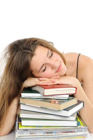 The young girl with long hair and the bookの写真素材