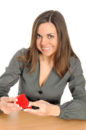  The beautiful woman with the open gift, on separately on a white backgroundの写真素材