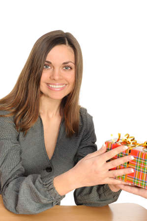   The happy woman with the gift, on separately on a white backgroundの写真素材
